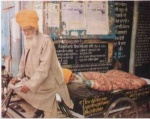 Bhagat Puran Singh carrying destitutes on his personal cycle Rikshaw